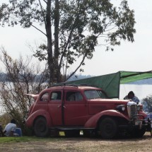 Nice ancient car on the shore of Rio Uruguay